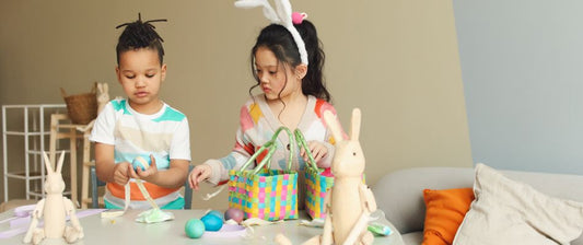two children making easter crafts