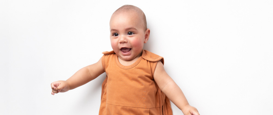 baby in caramel baby sleeping bag