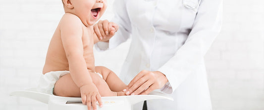 baby being weighed