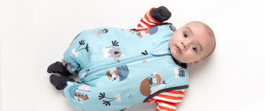 baby in sleeping bag with feet in pirate design