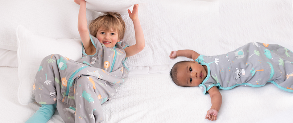 toddler and baby in baby sleeping bag and sleeping bag with feet