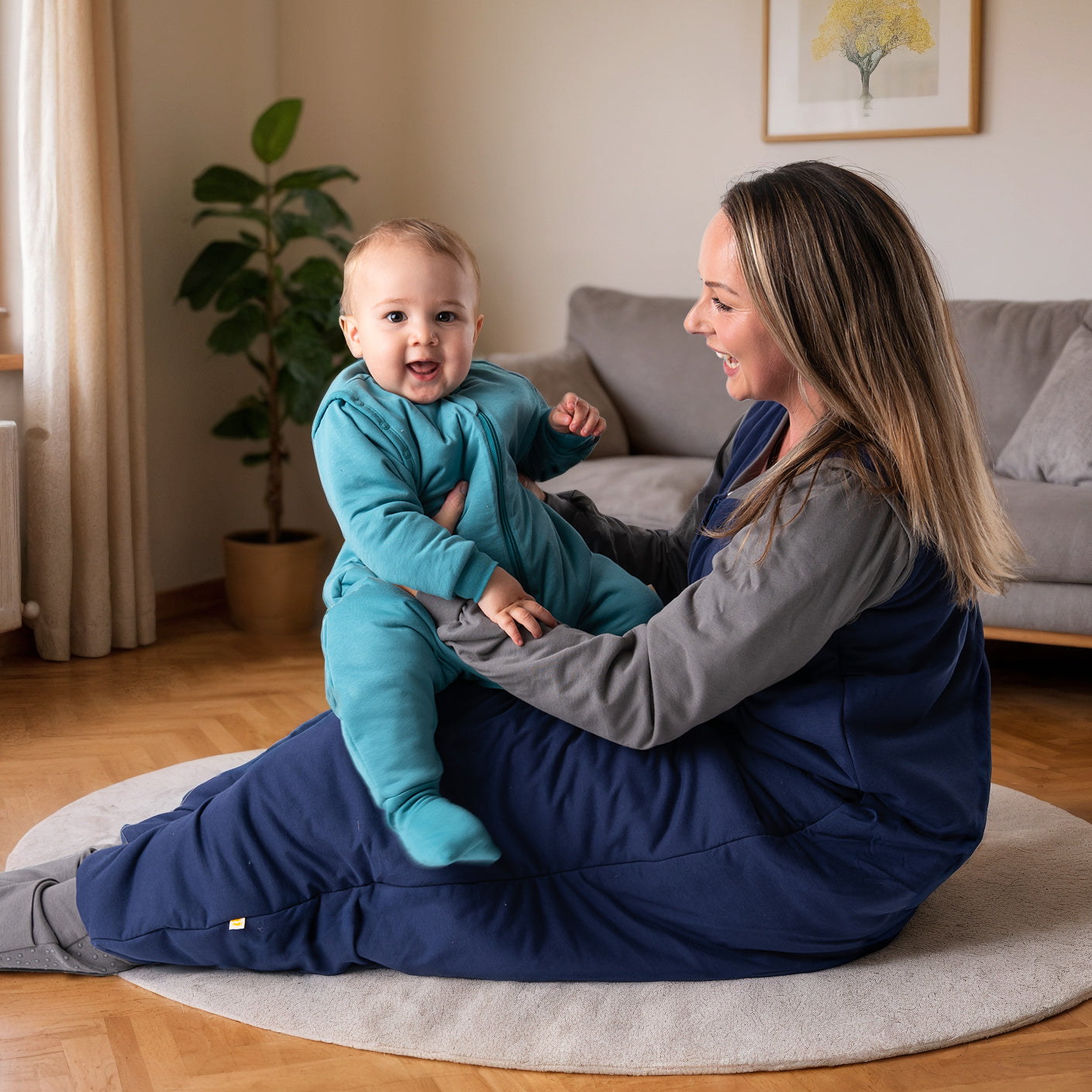 mother and child with sleeping bags with feet